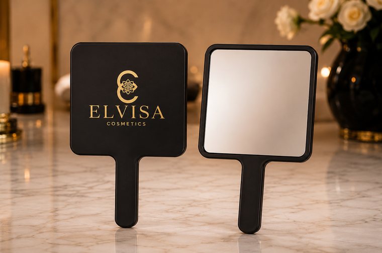 Elvisa signature hand mirror on marble